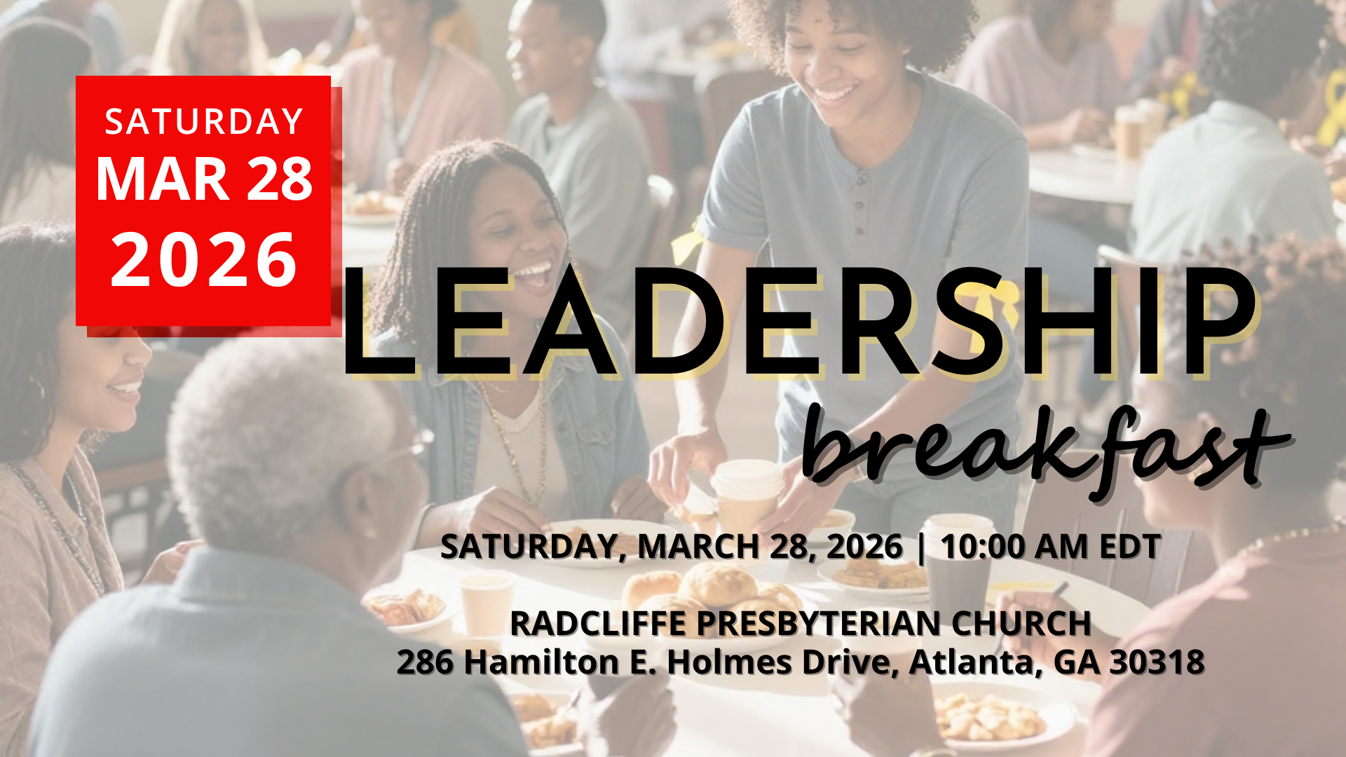 A diverse group of people smiling and sharing a meal at a Leadership Breakfast.